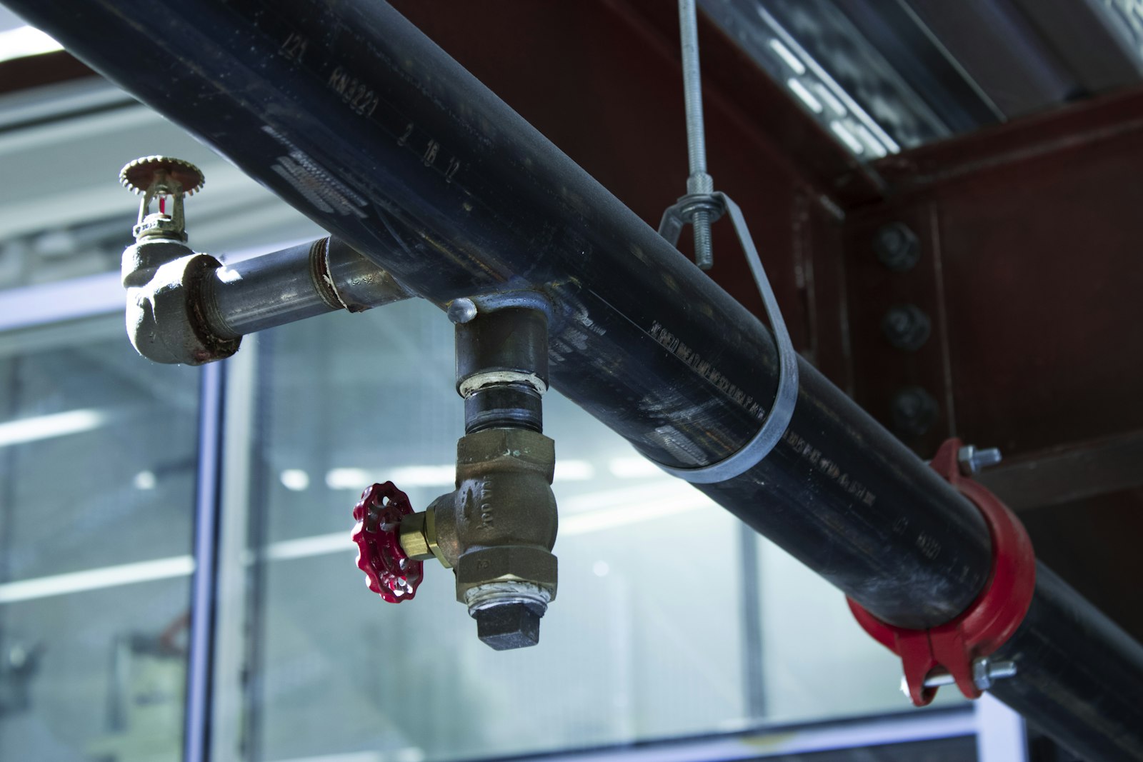 Water pipe with a red shutoff valve